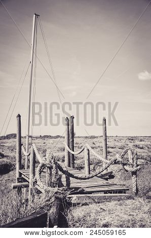 Small Wooden Pontoon Abobe A Dried Up River
