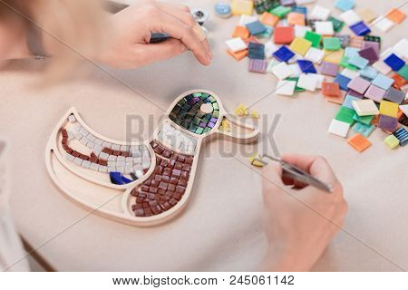 Workplace Of The Mosaic Master: Women's Hands Holding Tool For Mosaic Details In The Process Of Maki