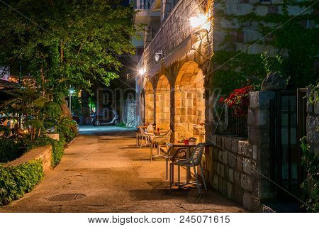 Montenegro, Przno - June 05/2017: The Restaurant Staff Prepared Their Tables Near The Sea For Dinner
