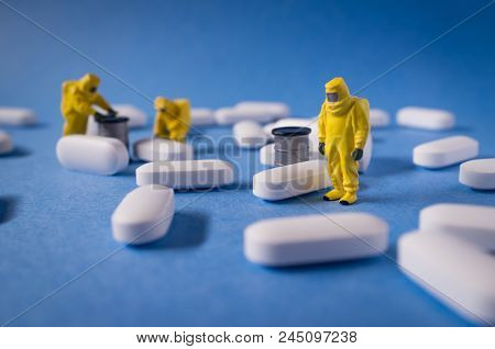 Miniature Hazmat Team Inspects Hazardous Pain Killer Pills