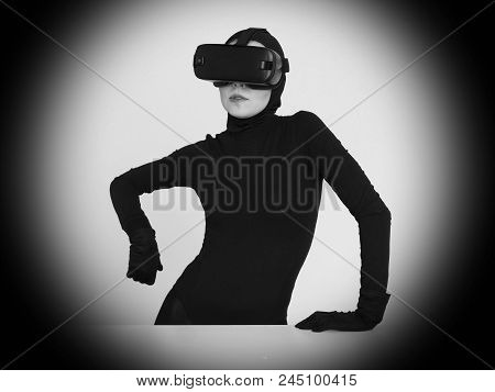 An Excited Woman Experiencing The Virtual Reality Helmet. Hi-tech Gadgets For Geeks And Technical En