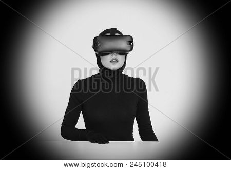 An Excited Woman Experiencing The Virtual Reality Helmet. Hi-tech Gadgets For Geeks And Technical En