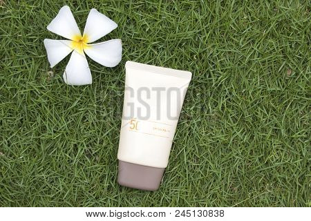 Natural Cosmetic For Skin Face Sunscreen Spf50 Of Lifestyle Woman Relax Summer With Frangipani Flowe
