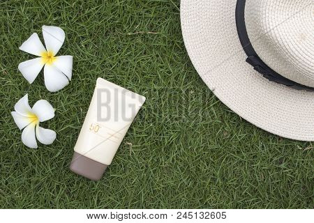 Natural Cosmetic For Skin Face Sunscreen Spf50 And Hat Of Lifestyle Woman Relax Summer With Frangipa