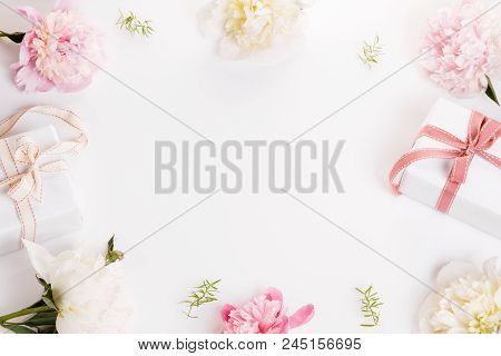 Festive Flower Composition On The White Wooden Background. Overh