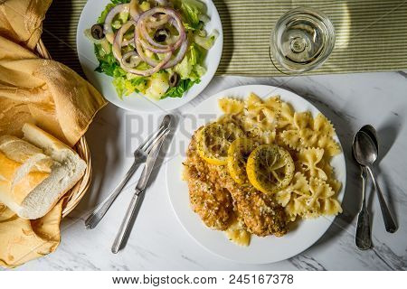 Italian American Chicken Francese With Farfalle Pasta And Side Salad