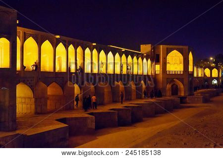 Isfahan, Iran - March 20, 2018: Khaju Bridge Over Dry Zayandeh River At Night In Spring