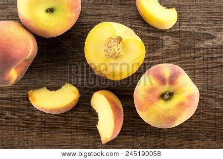Yellow Peaches Flatlay Collection On Brown Wood Background