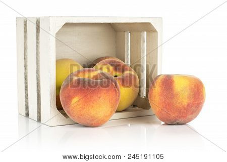 Yellow Ripe Peaches In A Wooden Box Isolated On White Background
