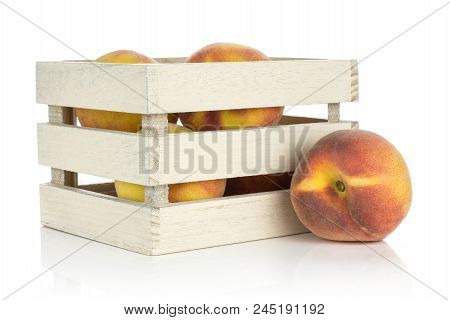 Yellow Peaches In A Wooden Box Isolated On White Background