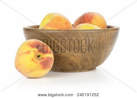 Yellow Ripe Peaches In A Wooden Bowl Isolated On White Background