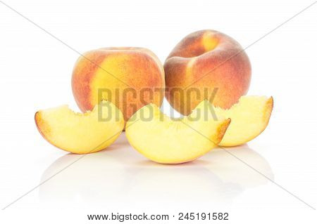 Two Yellow Peaches And Three Slices Isolated On White Background