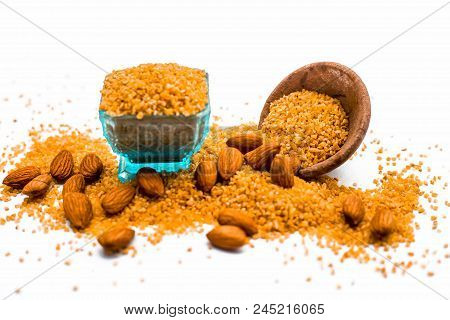 Close Up Of Raw Uncooked Dalia Or Bulgur Or Mixed Cereals Or Oats With Dry Fruits Ingredients For Da