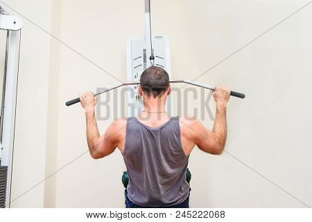 Back View Handsome Fitness Men, Patient At The Physiotherapy Doing Physical Exercises, Training Ches
