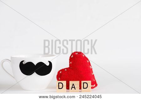 Happy Fathers Day Concept. Handmane Red Heart With Mustache And Bow Tie On Yellow Pastel Coffee Cup 