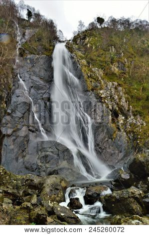Aber Falls In Snowdonia , Wales, In Full Winter Flow