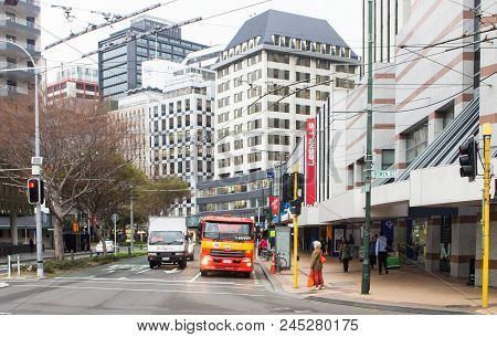 Wellington, New Zealand - 18 July 2016: Pedestrians And Vehicles Going About Their Day In Downtown W