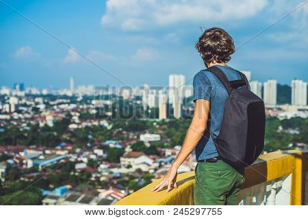 Young Man Tourist In Buddhist Temple Kek Lok Si In Penang, Malaysia, Georgetown.
