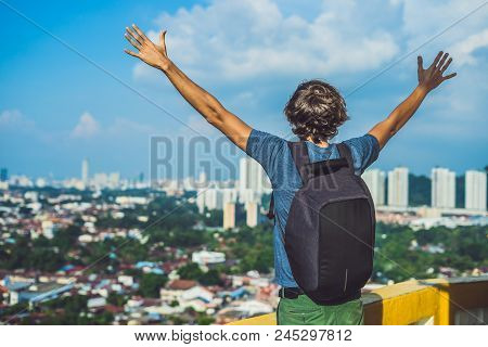 Young Man Tourist In Buddhist Temple Kek Lok Si In Penang, Malaysia, Georgetown.