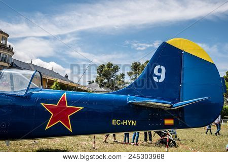 Madrid, Spain - June 3, 2018:  Yak 52 Russian Aerobatic Aircraft During Air Show Of Historic Aircraf