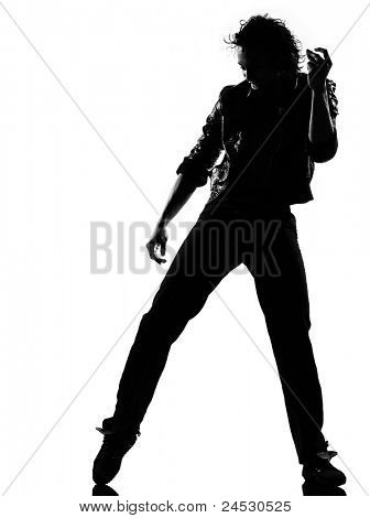 silhouette tutta la lunghezza di un giovane ballerino di danza funky hip hop r&b su ba studio isolato bianco