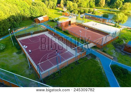 Moscow, Russia, May 27, 2018: Top View Of A Basketball Court And People In The Park. Aerial Photogra