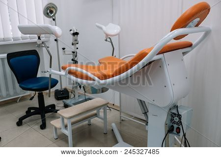 Workplace Gynecologist. Gynecological Chair, Doctor's Chair, Medical Lamp, Colposcope With Video Sys