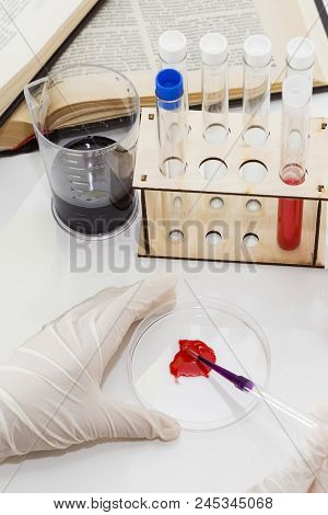 Lab Tube, Eppendorfs With Red Liquid. White Background. Studio Shot