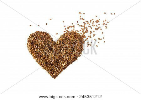 Sign  Heart Lined With Flax Seeds. Concept- Healthy Diet, Cancer Prevention, Vegetarianism, Raw Food
