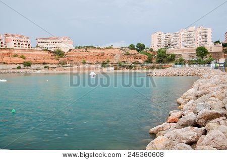 Residential Buildings On Red Sedimentary Rocks