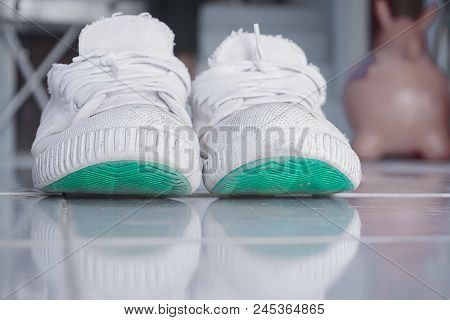 Old white shoes Used to play sepak takraw This is a Thai folk sport.