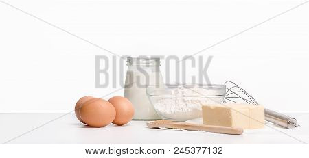 Food Ingredients On The Table, Sugar Eggs And Flour