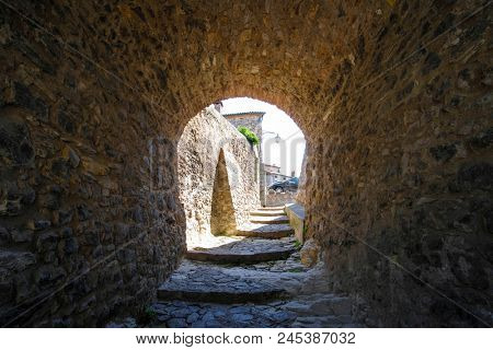 Arka Petrarka, Italy - June, 13, 2018: small street in an old town in Arka Petrarka, Italy