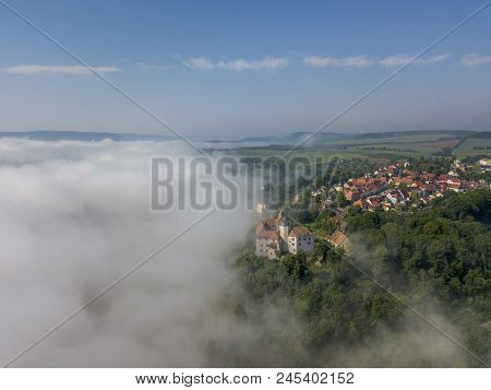 Three Castles Seen Over Cloud Sea In Dornburg, Thuringia, Germany