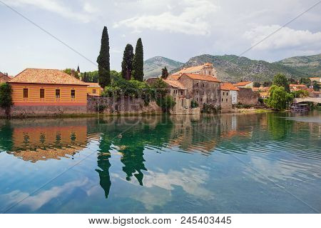 Ancient Town On River Bank. Bosnia And Herzegovina, View Of Trebisnjica River And Old Town Of Trebin