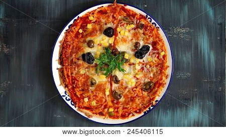 Deicious Pizza On The Table With Colorfull Background