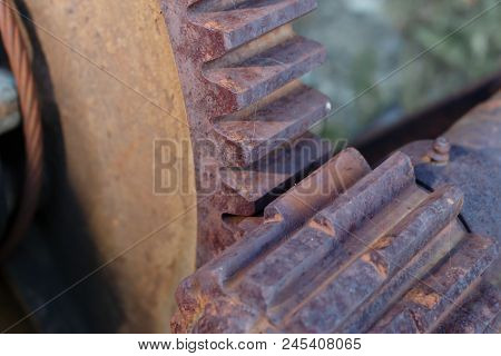 Old Rusty Industrial Machine Parts Gears Teeth Closeup