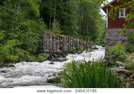 The Little Whitewater Next To An Old Mill.
