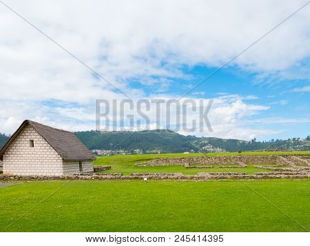 Ecuador May 2018 Reconstruction Of An Inca House And Ruins Of The Old Village. Archeologial Park Of 