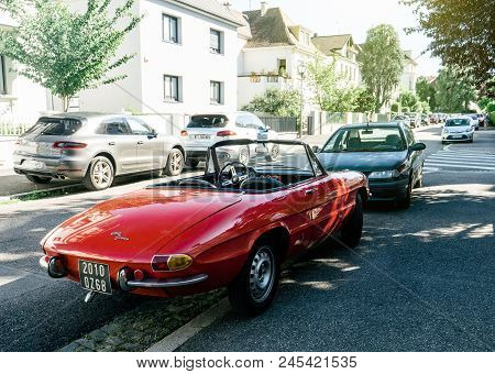 Strasbourg, France - Jun 6, 2017: Rear View Of Vintage Alfa Romeo Spider Red Vintage Convertible Par