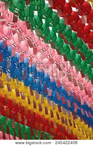 SEOUL-SOUTH KOREA, MAY 20, 2018:  Close up of the lanterns with wishes at Jogyesa Temple.  It is one of the most important Buddhist temples in Korea with traditional hanji paper lanterns 