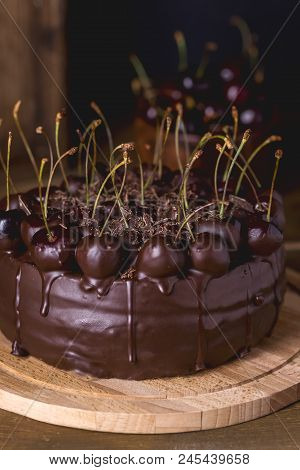 Chocolate Cake Decorated With Cherries With Chocolate Vertical Rustic Dark Photo Tasty And Beautiful
