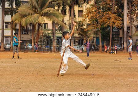 A Kid Practicing Fast Bowling To Improve Cricketing Skills At Mumbai Grounds