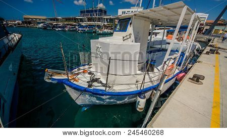 The Old Fishing Boats Are Waving On The Waves. Shipyard  In Limassol, Cyprus,  August 2017