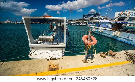 The Old Fishing Boats Are Waving On The Waves. Shipyard  In Limassol, Cyprus,  August 2017