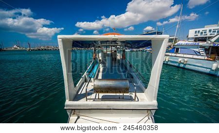 The Old Fishing Boats Are Waving On The Waves. Shipyard  In Limassol, Cyprus,  August 2017