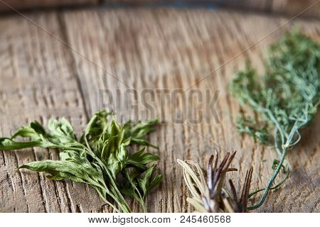 Parsley And Dill On Wooden Background, Top View, Close-up, Selective Focus. Some Copy Space. Natural