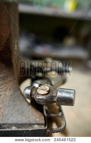 Big Heavy Anvil And Hammer In The Blacksmith's Workshop, Close-up, Shallow Depth Of Field, Vertical.