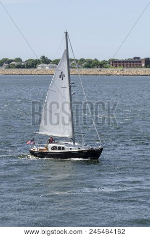 Fairhaven, Massachusetts, Usa - June 12, 2018: Sailboat Laura P. Approaching Hurricane Barrier On Ac