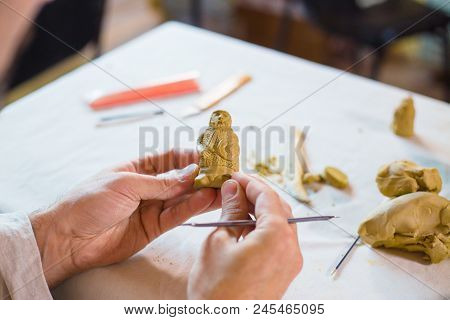 Professional Male Potter Making Clay Figure For Medieval Popular Strategy Board Game - Tafl. Handwor
